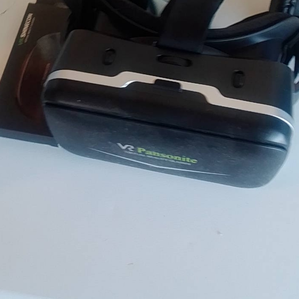 Panasonite Virtual reality headset with glasses